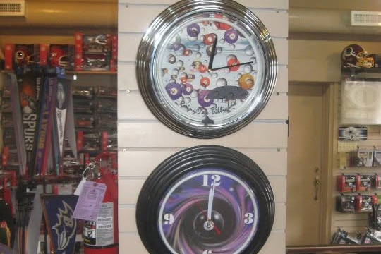 Neon style wall clocks on display